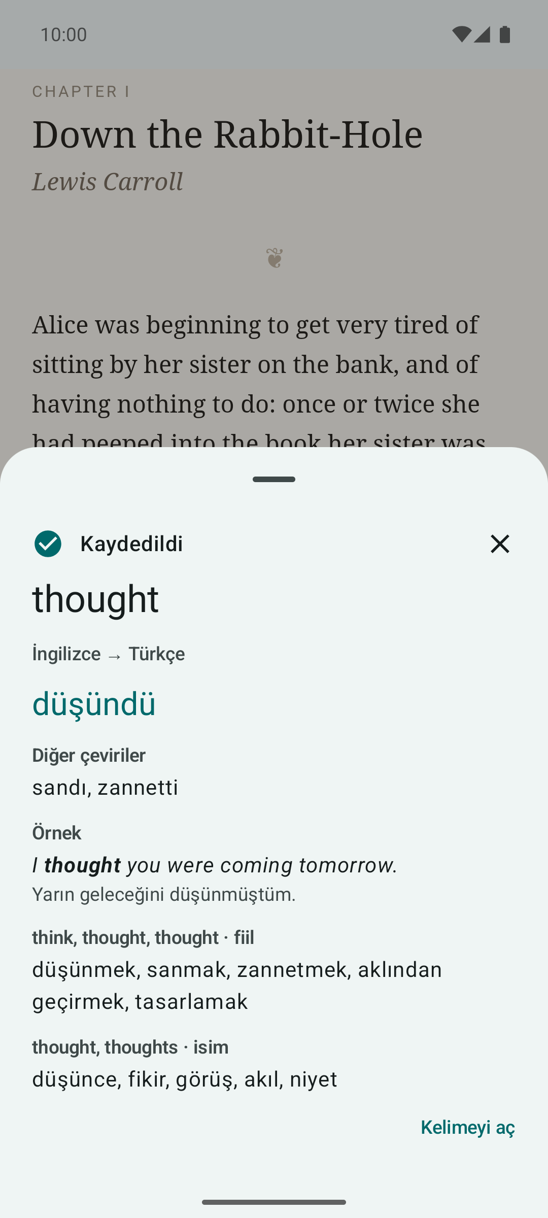 Kitap sayfasının üstünde açılan Wordrook penceresi: “thought” kaydedildi, çevirisi “düşündü”, diğer çeviriler ve örnek cümle.